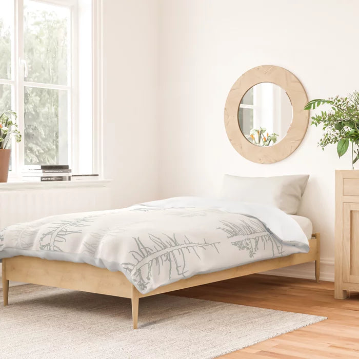 Pines against the snow duvet cover