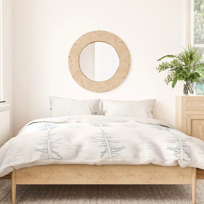 Pines against the snow duvet cover