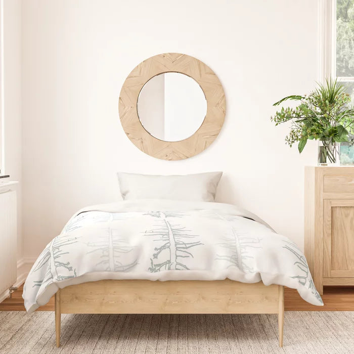 Pines against the snow duvet cover