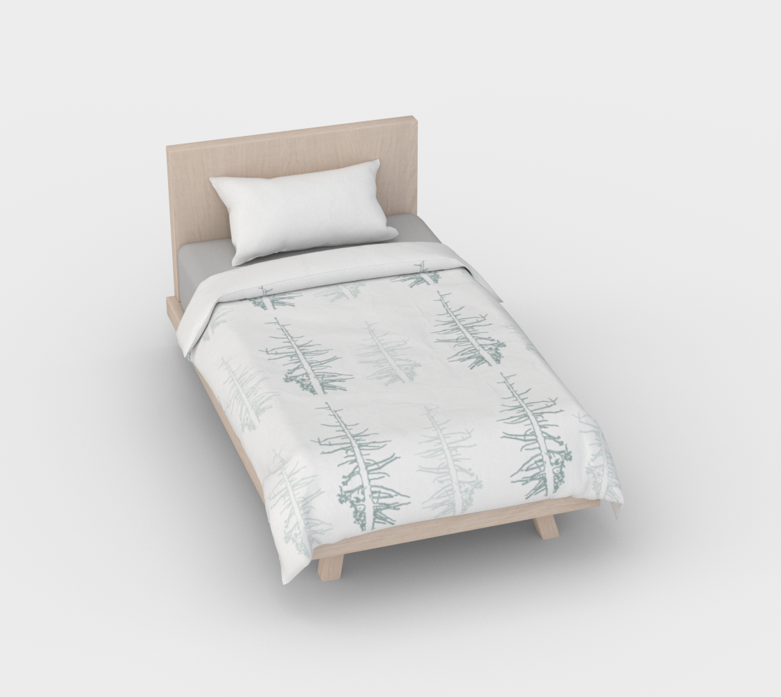 Pines against the snow duvet cover