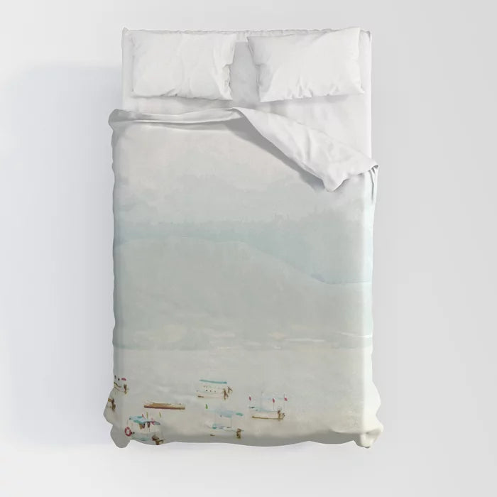 Colorful boats on a pale lake duvet