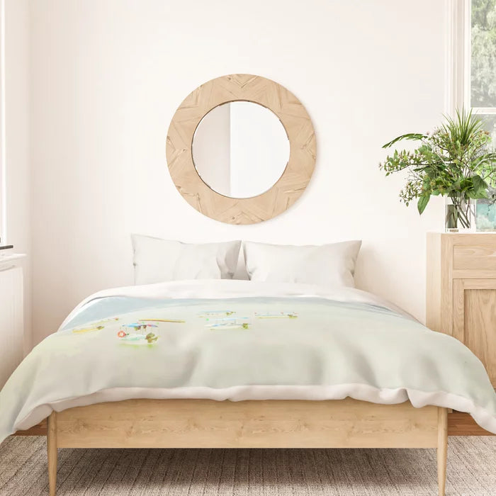 Colorful boats on a pale lake duvet